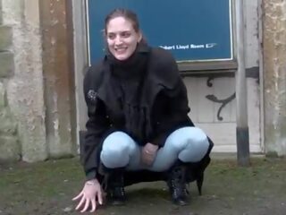 Horny mistress pisses in leggings and vids her tits in public